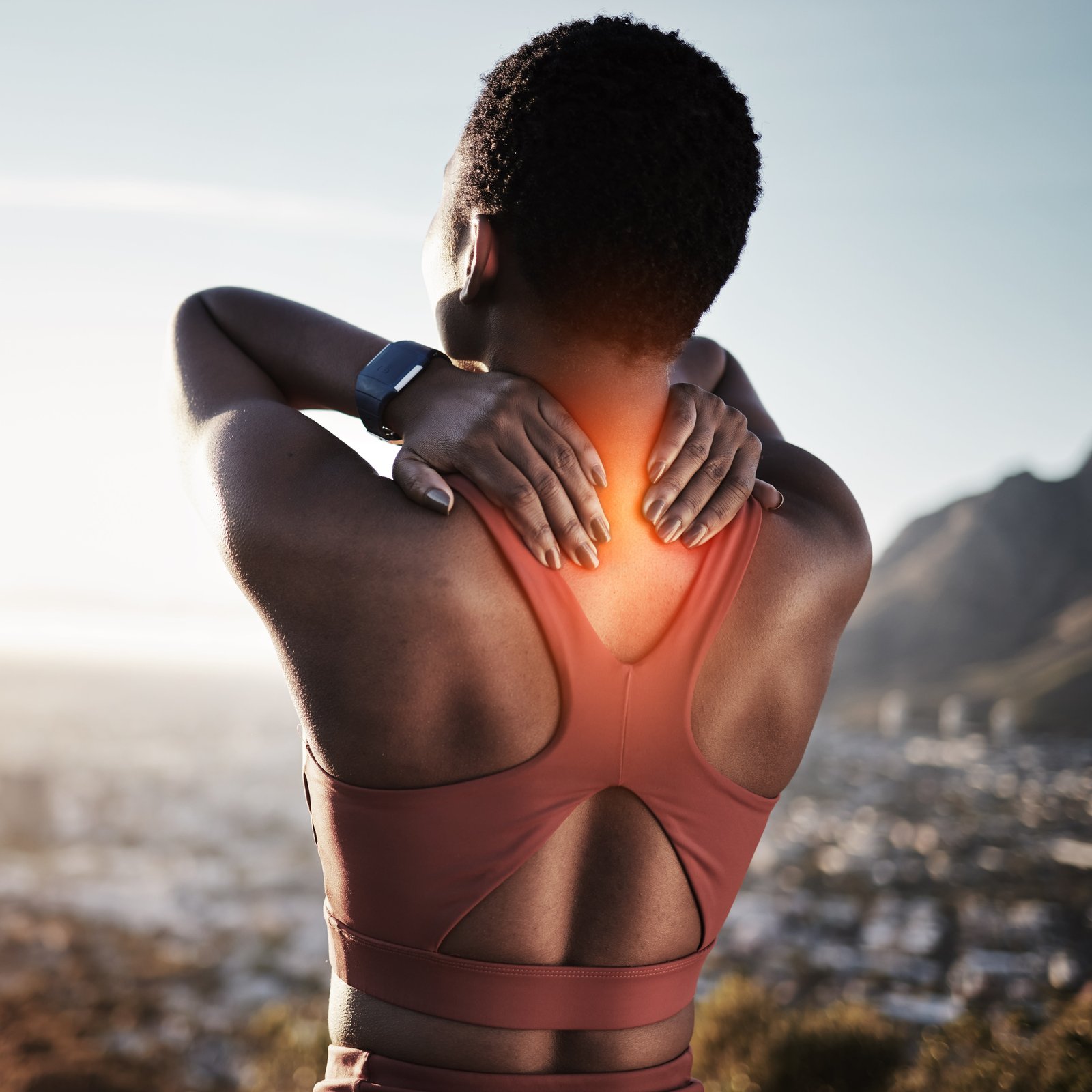 back-pain-fitness-black-woman-nature-experience-running-training-accident-mountains-woman-athlete-back-run-feeling-pain-from-exercise-runner-workout-injury-mountain-path
