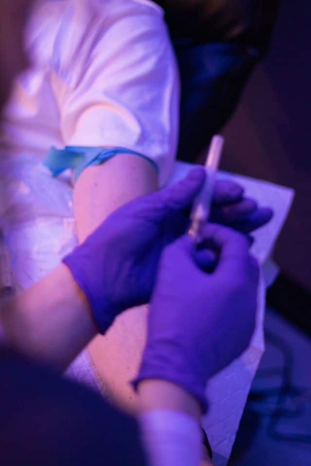 Intramuscular injection therapy administered at Elysian Institute in Bigfork, Montana