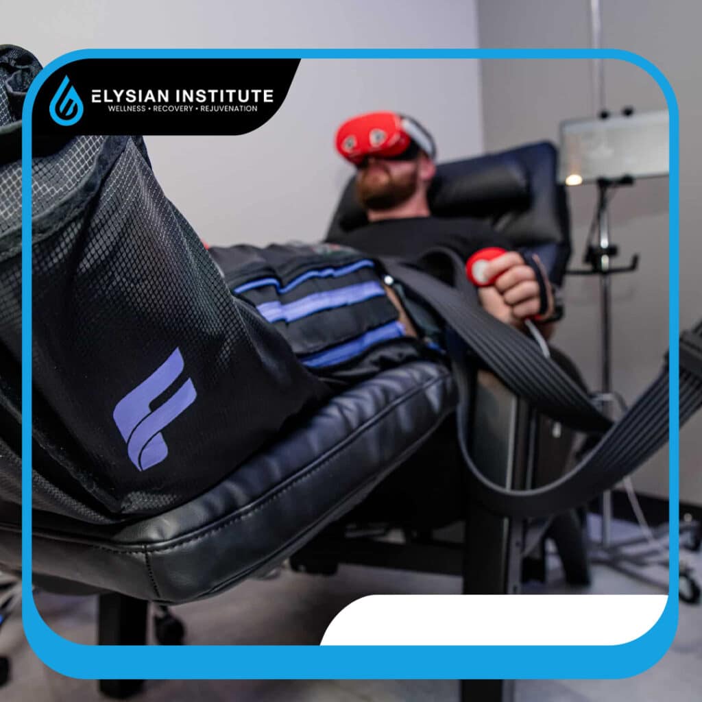 A close-up view of a patient relaxing in a recliner wearing lower-body pneumatic compression boots and a red VR headset in a clinical recovery lounge.